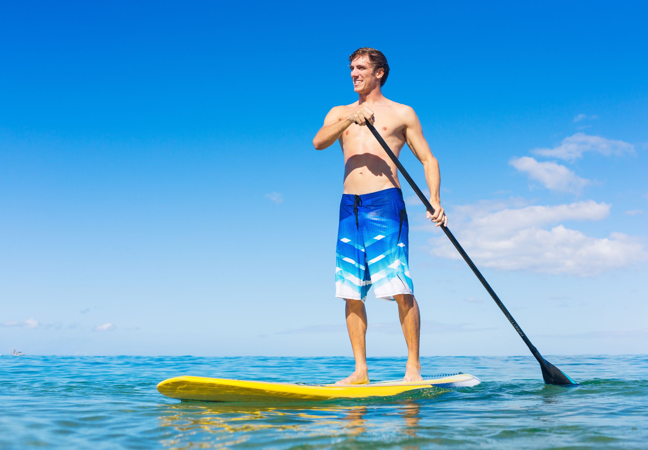 Learn to paddle board in the Caribbean - Global Medical Staffing Blog