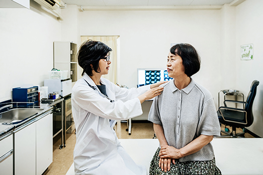 Doctor Examining Patient