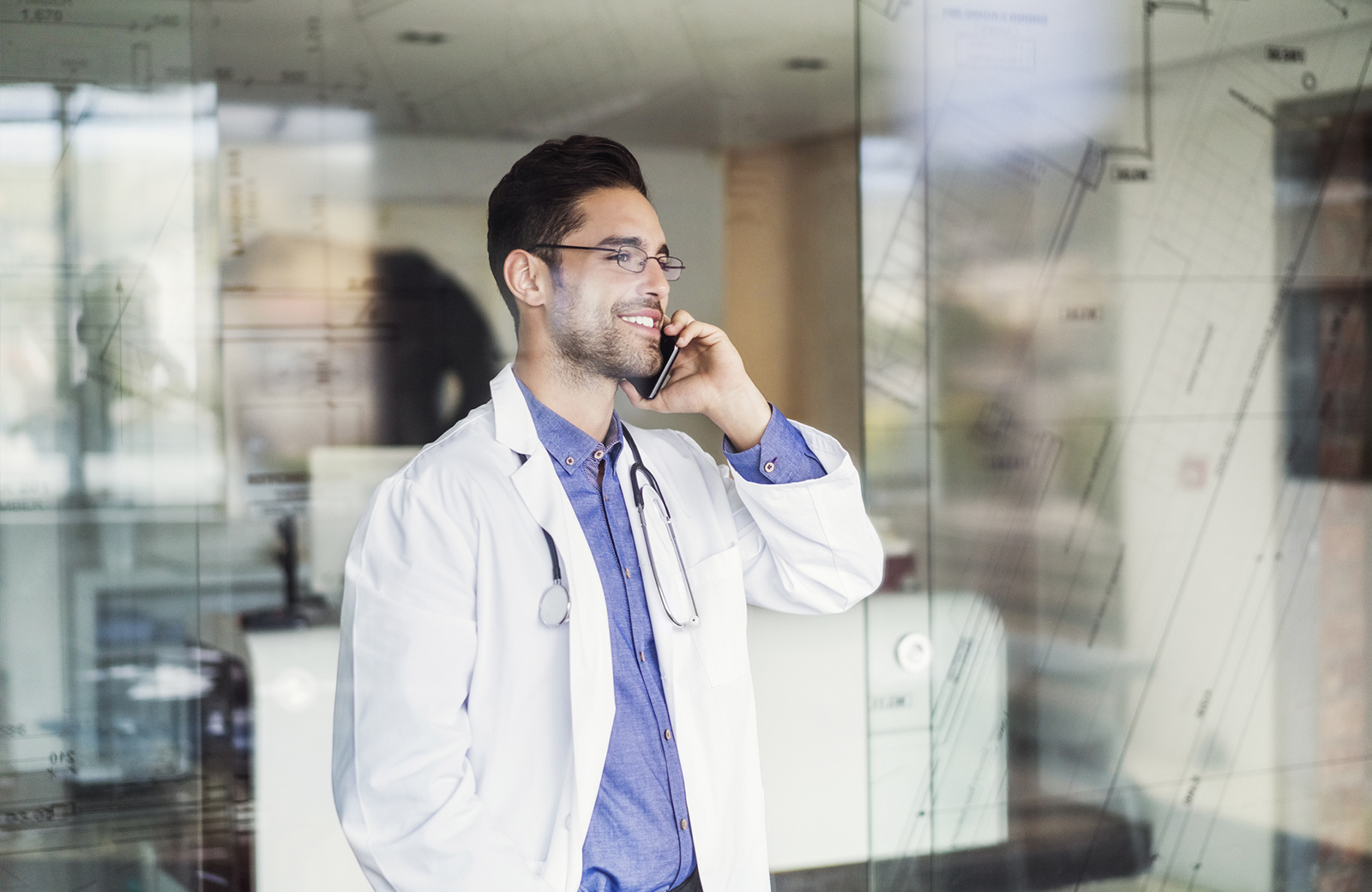 Doctor talking on phone