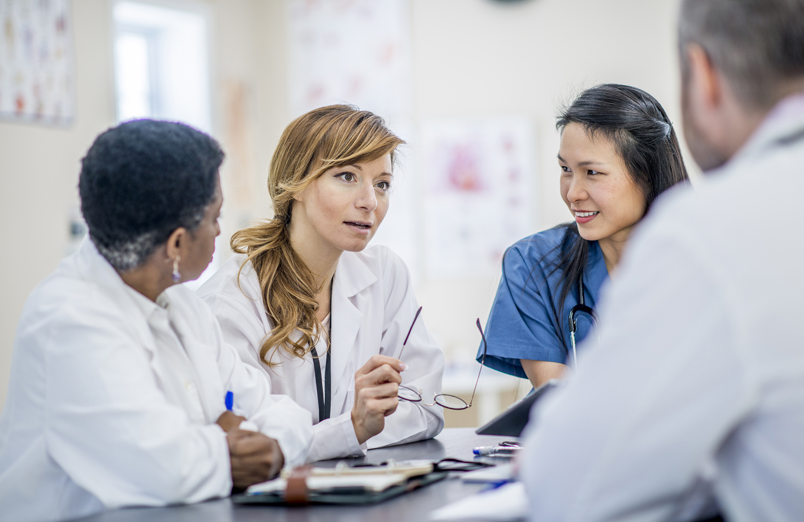 Several doctors around a table