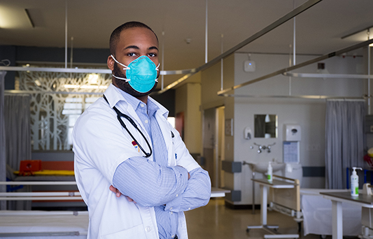 Physician wearing a mask