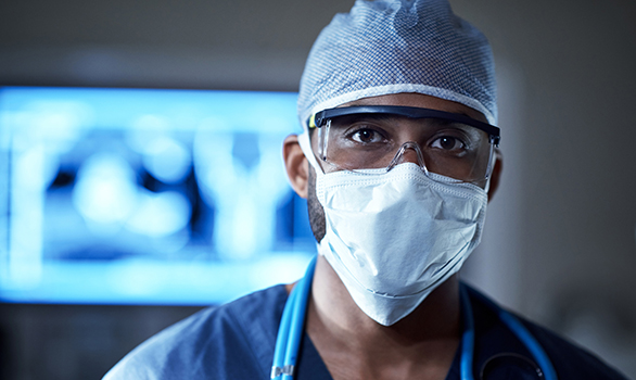 International locums physician wearing PPE