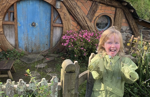 Dr Parrish's daughter at hobbit house in NZ